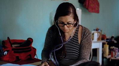 Ximena Rojas has assisted in more than 350 births [Meghan Dhaliwal/Al Jazeera]