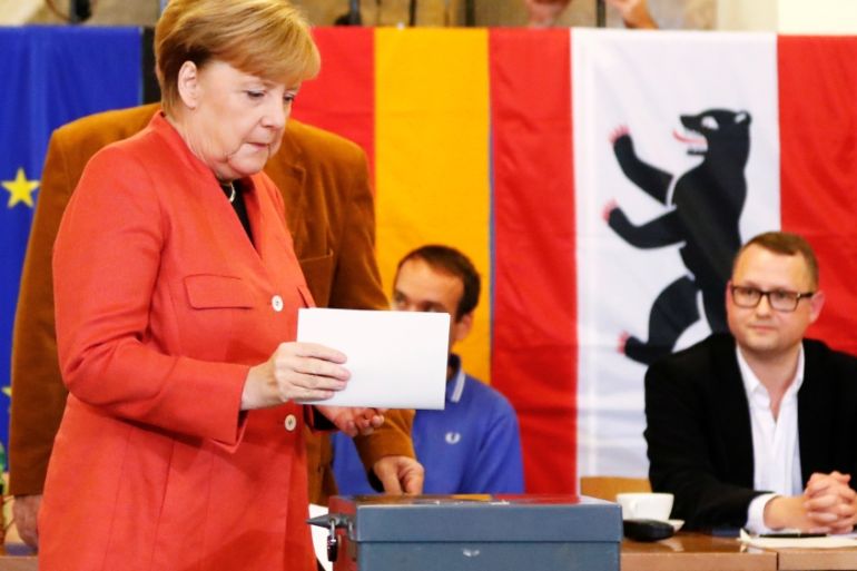 German Chancellor Angela Merkel votes in the general election in Berlin