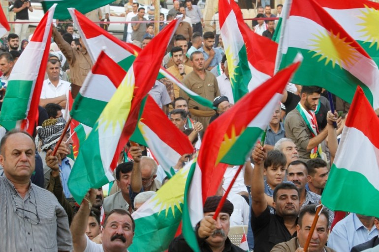 People celebrate to show their support for the upcoming September 25th independence referendum in Kirkuk
