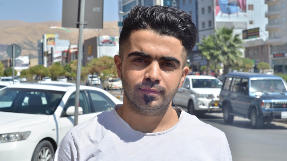 University student Rebaz Qadir says he will boycott the referendum, which he believes is part of an 'agenda' [Halwest Abdulkareem/Al Jazeera]