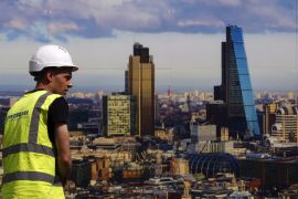 UK worker in front of London Skyline