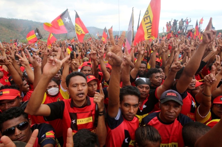 Supporters of the FRETILIN political party shout during a rally on the last day of campaigning ahead of this weekend''s parliamentary elections in Dili