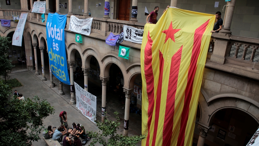 Separatist supporters inside the University of Barcelona's historic building a day before the vote [Enrique Calvo/Reuters]