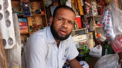 Mohammad Haroon runs a small grocery store [Sanjay Kumar/Al Jazeera]