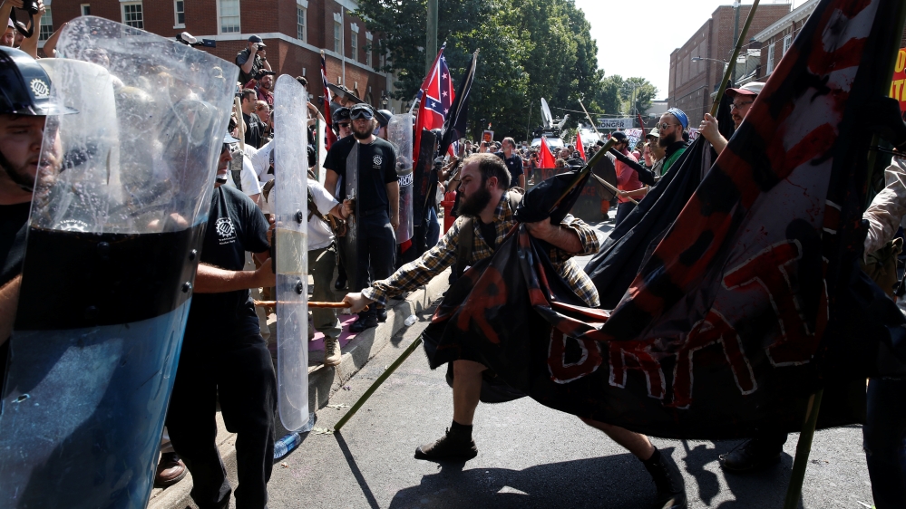 White nationalists clash with a group of anti-racist protesters in Charlottesville, Virginia [File: Joshua Roberts/Reuters]