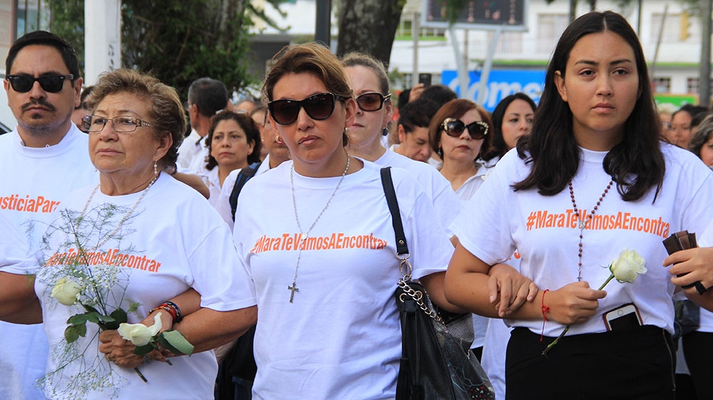 Mara Castilla's family members march in Xalapa, Veracruz state, Mexico [AFP]