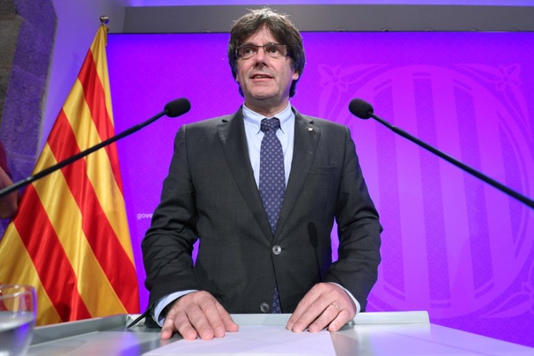 Catalan regional President Carles Puigdemont attends a news conference at Palau de la Generalitat in Barcelona