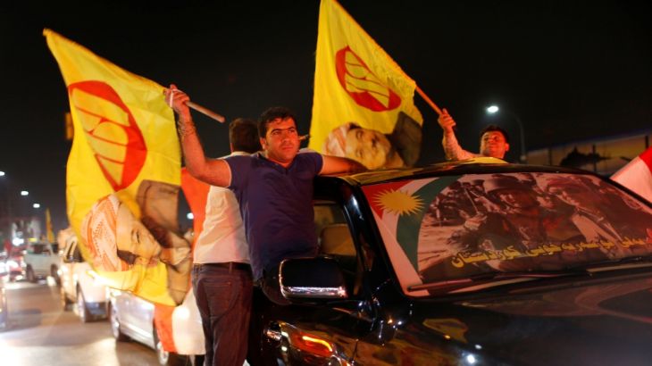 Kurds celebrate to show their support for the independence referendum in Erbil