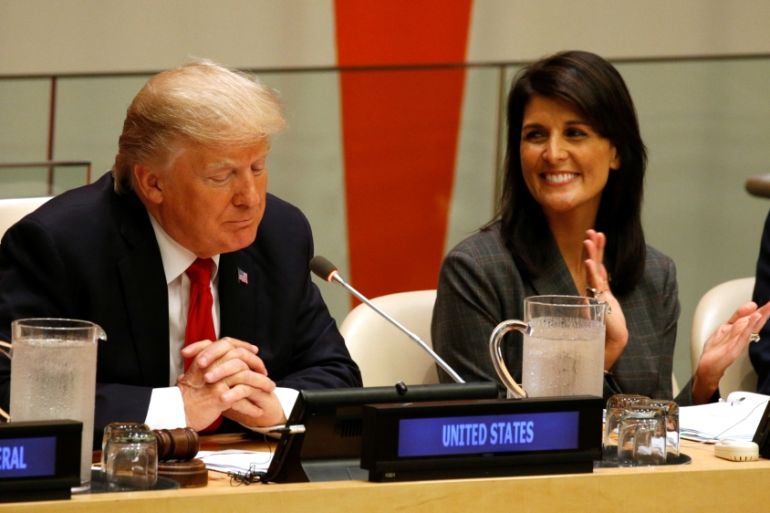 U.S. Ambassador the the U.N. Nikki Haley applauds as U.S. President Donald Trump speaks during a session on reforming the United Nations at U.N. Headquarters in New York