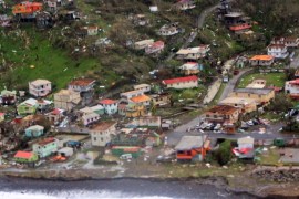 Damaged homes from Hurricane Maria are shown in this aerial photo over the island of Dominica