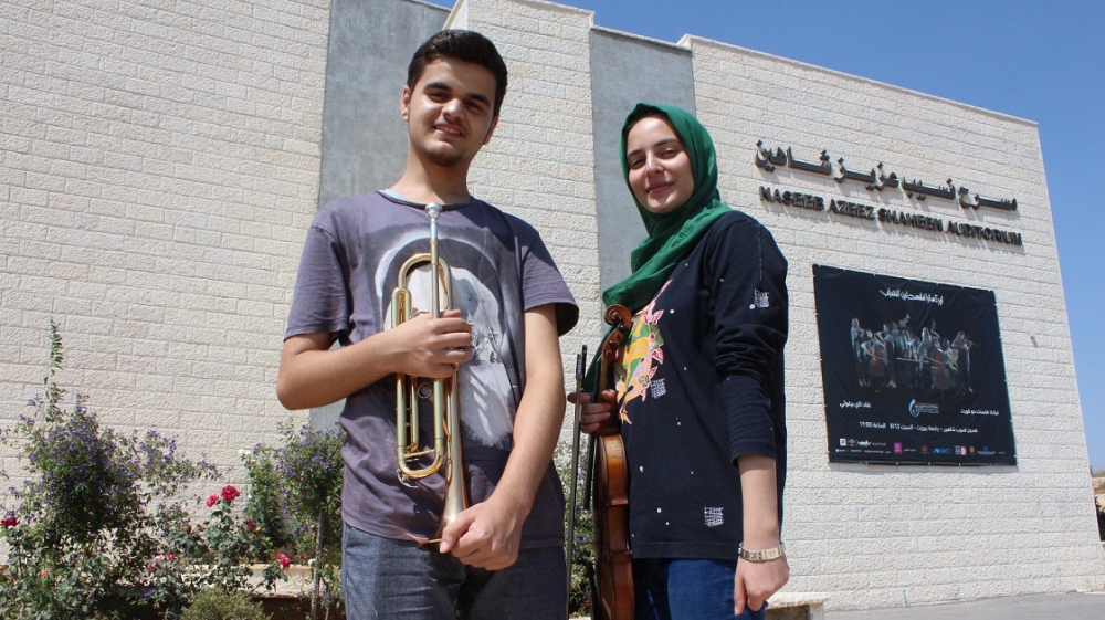 Gaza-based musicians Sofiya Radwan and Raslan Ashour performed with the Palestine Youth Orchestra on its 2017 summer tour [Nigel Wilson/Al Jazeera]
