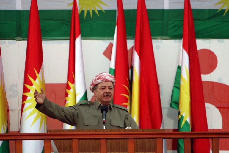 Iraqi Kurdish president Barzani salutes the crowd while attending a rally that shows the support for the upcoming September 25th independence referendum in Erbil