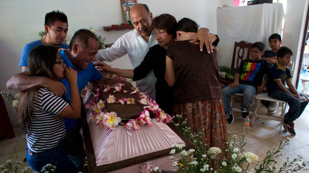 Dozens of people were being buried, victims of the most powerful earthquake to hit Mexico in 100 years [Rebecca Blackwell/AP]