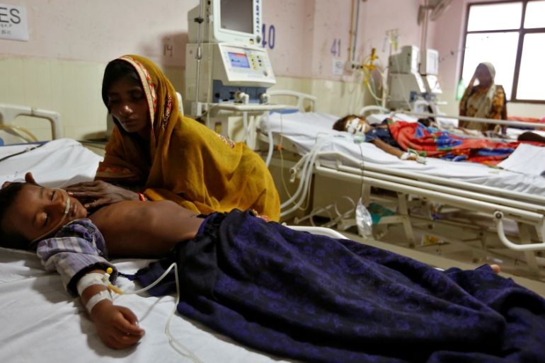 Children are seen in the Intensive care unit in the Baba Raghav Das hospital in Gorakhpur district