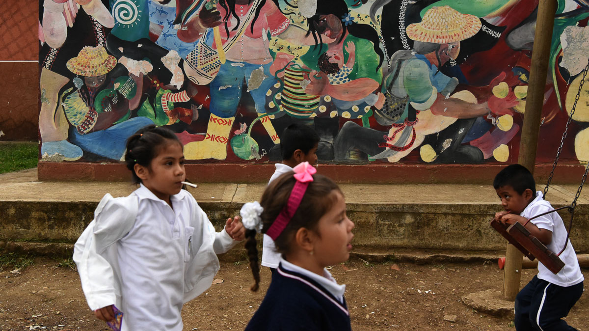 Children play outside their school in Toribio [Christian EscobarMora/Mira-V/Al Jazeera]