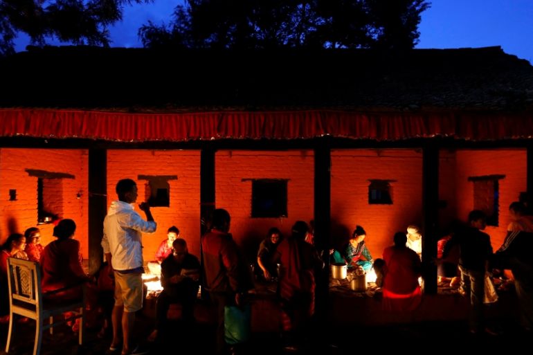 Devotees light oil lamps during "Dashain", a Hindu religious festival in Bhaktapur