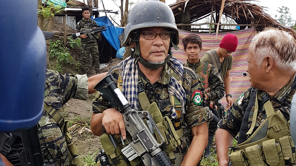 Wahid Tundok commands an elite unit of the MILF. He and his troops recently drove pro-ISIL fighters from a community in Maguindanao province in the southern Philippines [JC Gotinga/Al Jazeera]
