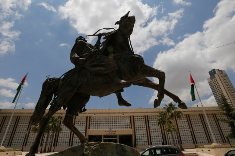 The Memorial Statue is pictured outside the parliament building in Amman
