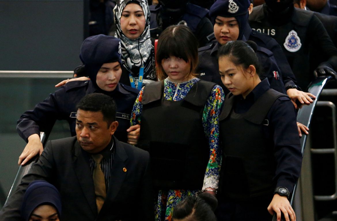 Vietnamese Doan Thi Huong, who is on trial for the killing of Kim Jong Nam, the estranged half-brother of North Korea''s leader, is escorted as she revisits the Kuala Lumpur International Airport 2 in