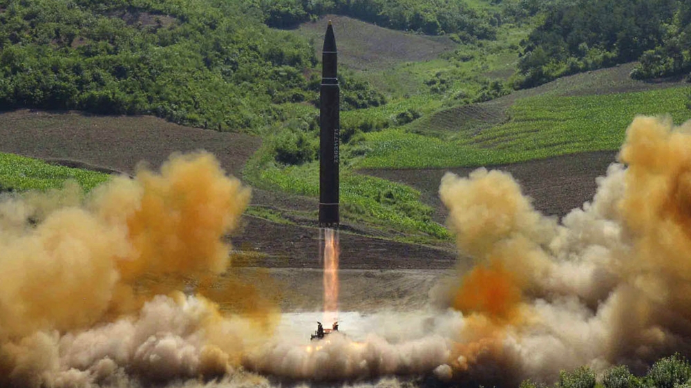 This file photo distributed by the North Korean government shows what was said to be the launch of a Hwasong-14 intercontinental ballistic missile, ICBM, in North Korea's northwest, Tuesday, July 4, 