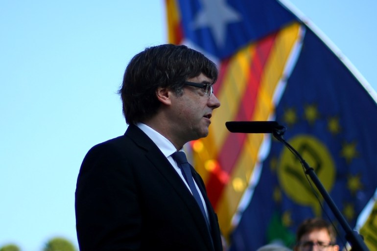 Catalan President Carles Puigdemont delivers a speech at the memorial of "Fossar de la Pedrera" (Pedrera mass grave) in Barcelona,