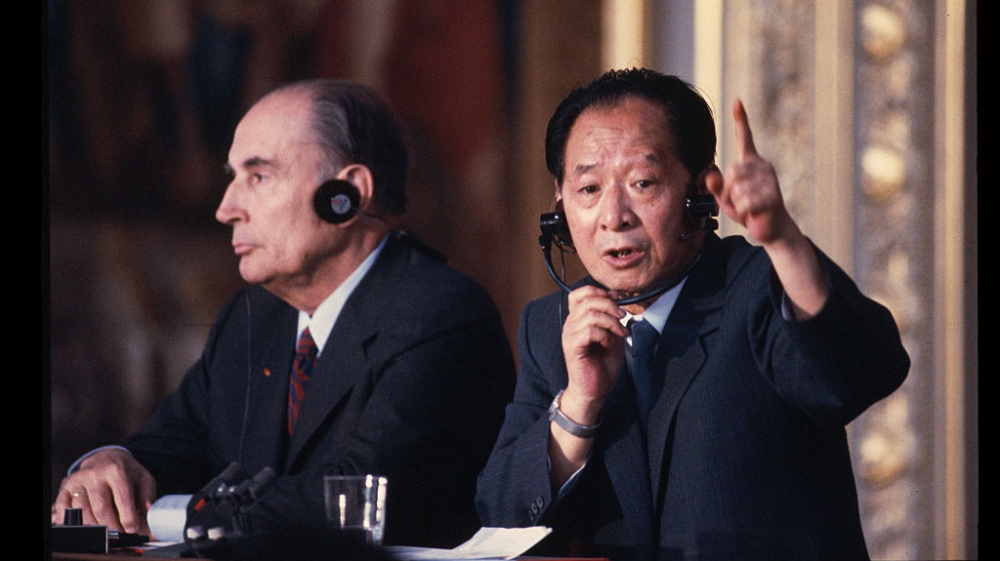Hu Yaobang and Francois Mitterrand [Peter Turnley/Corbis/VCG via Getty Images]