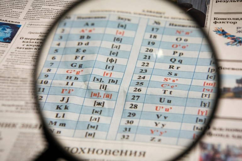 An illustration image shows the new Latin-based Kazakh alphabet published in newspaper in Almaty