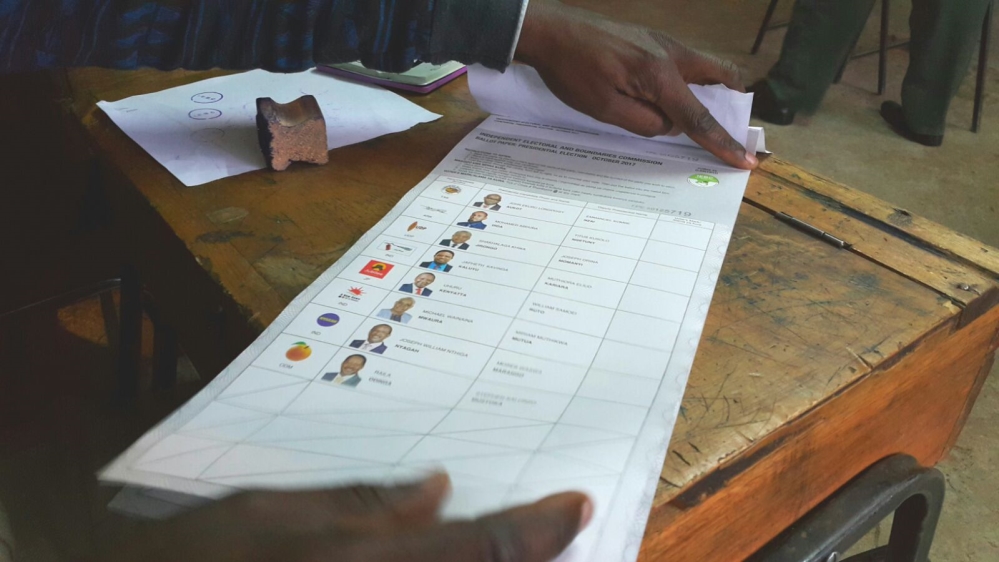 None of the candidates competing against Kenyatta has a chance at winning Thursday's vote. They all scored less than one percent in August [Hamza Mohamed/Al Jazeera]