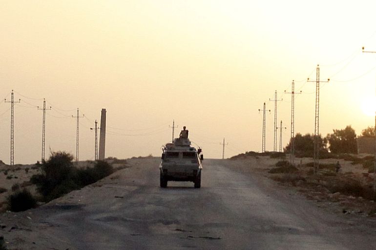 FILE PHOTO: An Egyptian military vehicle is seen on the highway in northern Sinai
