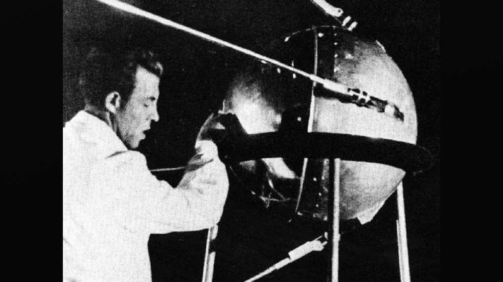 This handout October 1957 NASA image shows a technician putting the finishing touches on Sputnik 1, the first artificial satellite [AFP PHOTO/NASA/HO]