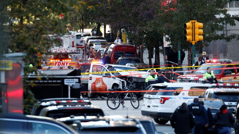A Home Depot truck which struck down multiple people on a bike path, killing several and injuring numerous others, is seen as New York city first responders are at the crime scene [Brendan McDermid/Reuters]