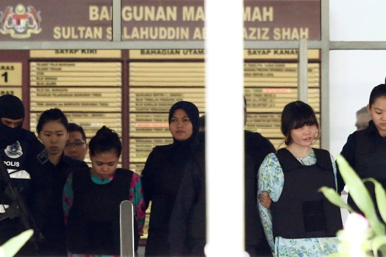Vietnamese Doan Thi Huong and Indonesian Siti Aisyah who are on trial for the killing of Kim Jong Nam, the estranged half-brother of North Korea''s leader, are escorted as they leave the Shah Alam