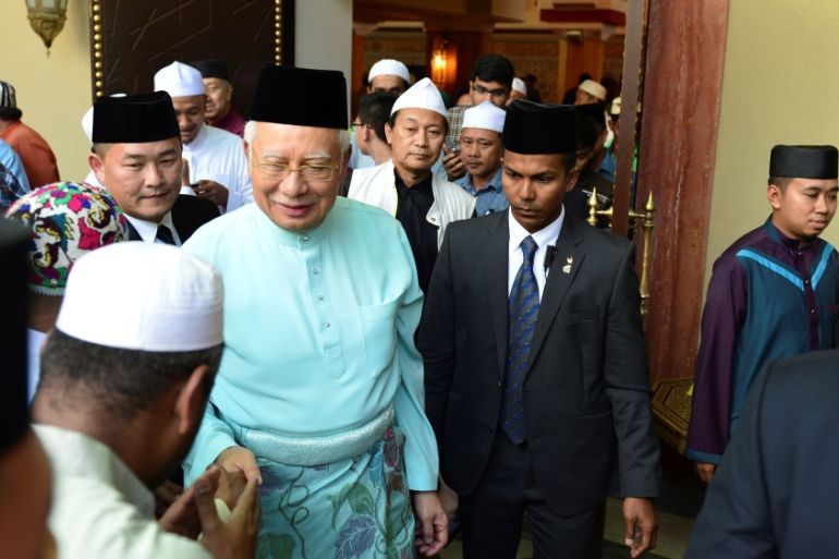 Malaysia''s Prime Minister Najib Razak leaves a mosque after Friday prayers in Bandar Seri Begawan, Brunei