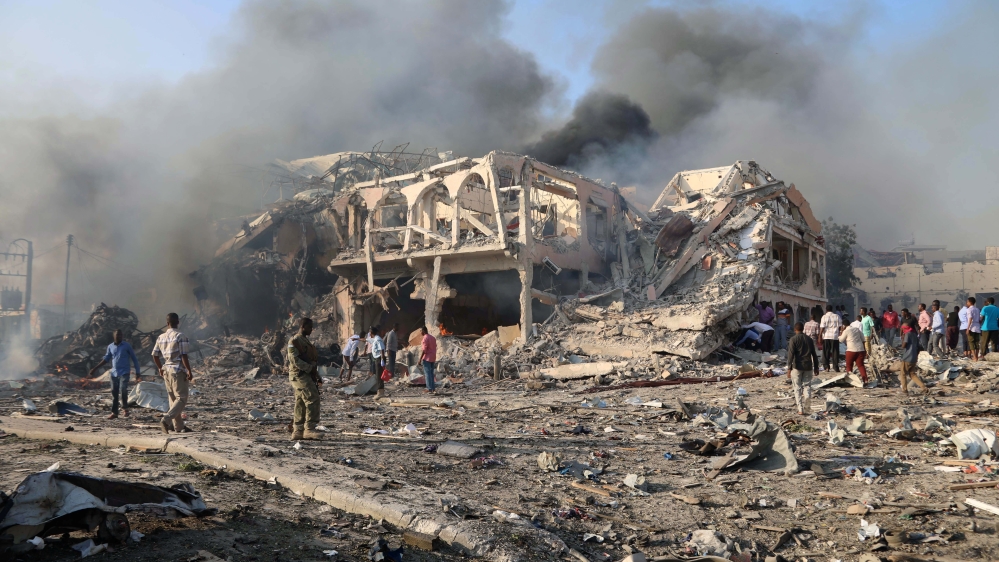 The blast also destroyed nearby homes and businesses [Feisal Omar/Reuters]