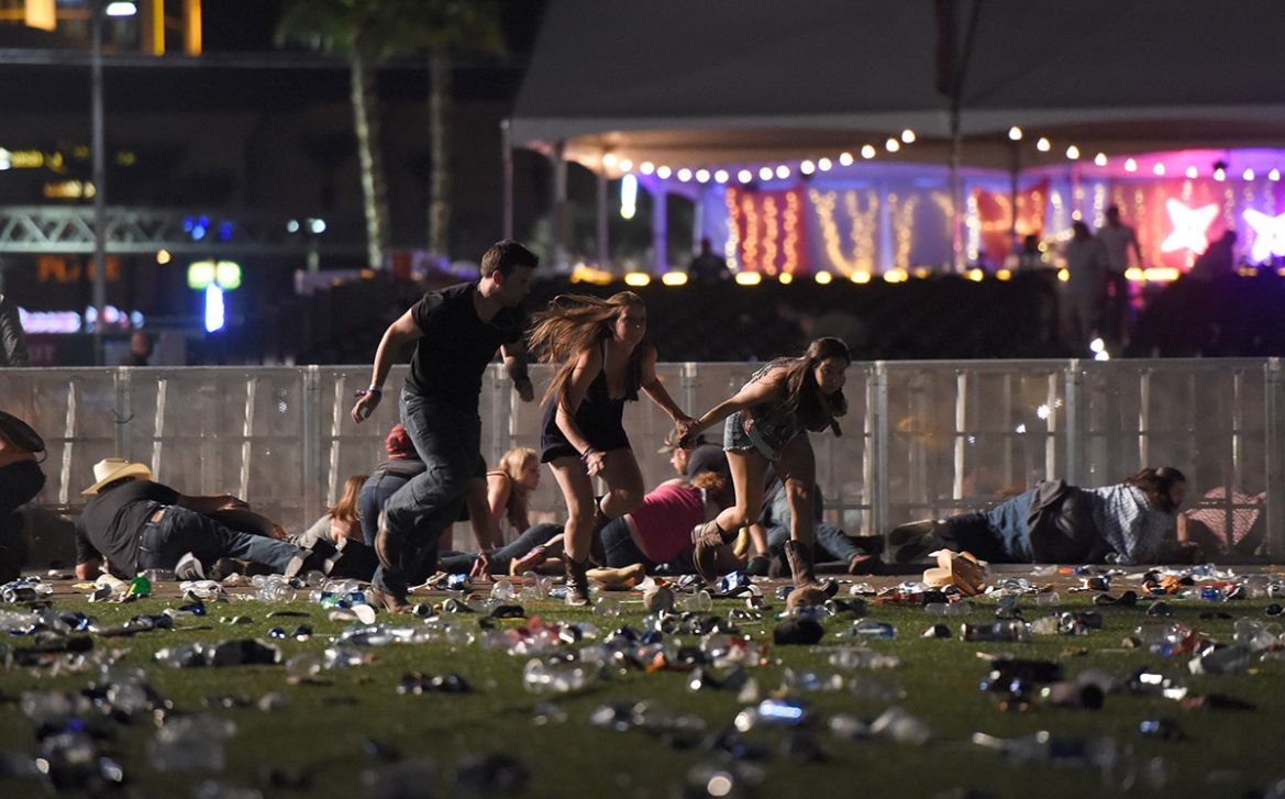 People run from the Route 91 Harvest country music festival after apparent gun fire was heard on October 1, 2017 in Las Vegas, Nevada. There are reports of an active shooter around the Mandalay Bay Re