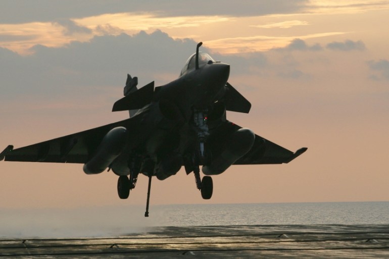 A French Navy Rafale jet fighter prepares to land on the Charles de Gaulle aircraft carrier on April 20, 2011 in the Mediteranean sea, as part of the military operations of the Nato coalition in Libya