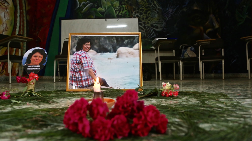 Flowers lie as part of a memorial to slain Honduran activist Berta Caceres, who was shot in her home on March 2nd, 2016 [File: Kavitha Chekuru/Al Jazeera] 