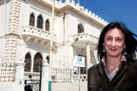Maltese investigative journalist Daphne Caruana Galizia poses outside the Libyan Embassy in Valletta