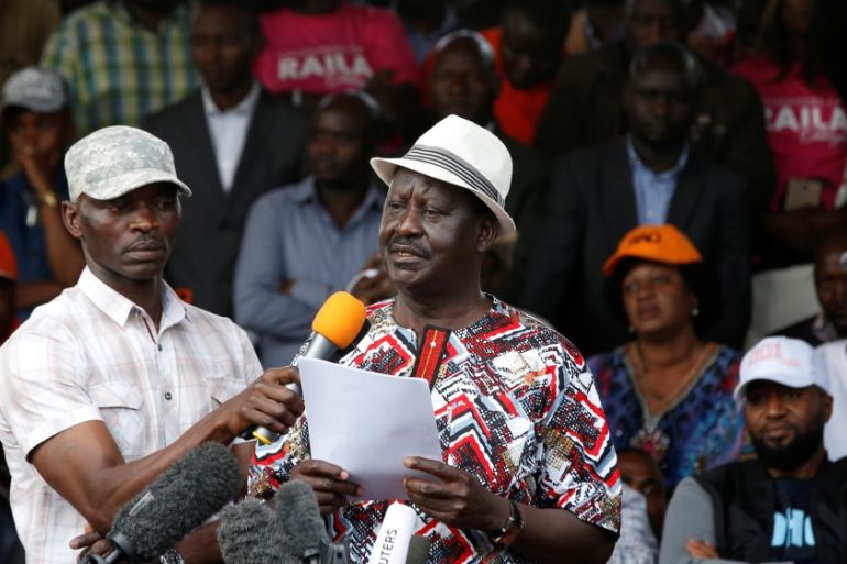 Kenyan opposition leader Raila Odinga, the presidential candidate of the National Super Alliance (NASA) coalition, addresses his supporters during a rally at the Uhuru Park in Nairobi