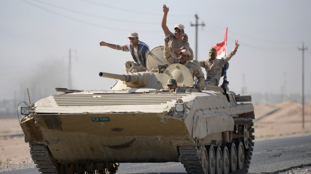 Iraqi soldiers advancing in Kirkuk [Reuters]