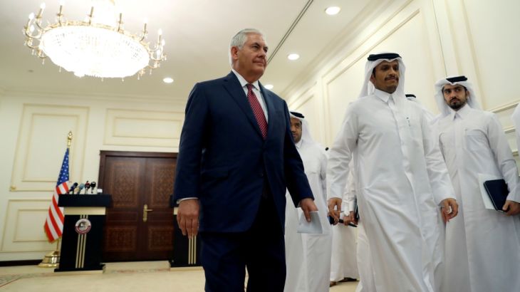 U.S. Secretary of State Rex Tillerson departs with Qatar''s Foreign Minister Sheikh Mohammed bin Abdulrahman Al Thani after a media availability