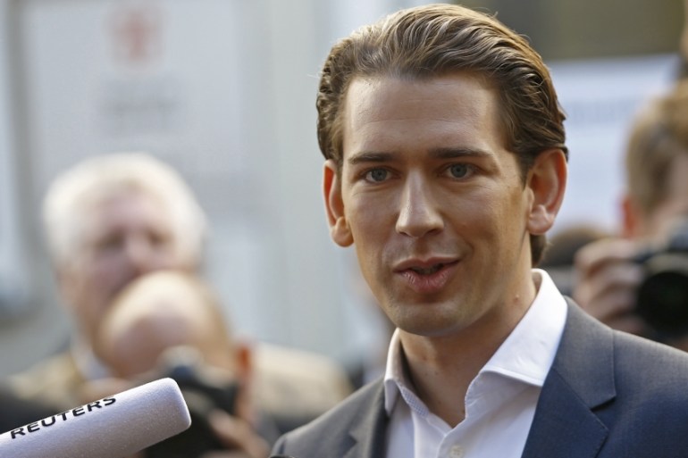 Top candidate of OeVP Kurz talks with journalist after leaving a polling station in Vienna