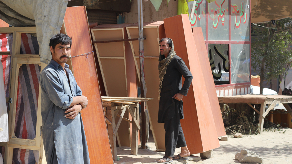 Death is now such a frequent occurrence in Kabul that coffin-making is one of the few thriving businesses [Al Jazeera]