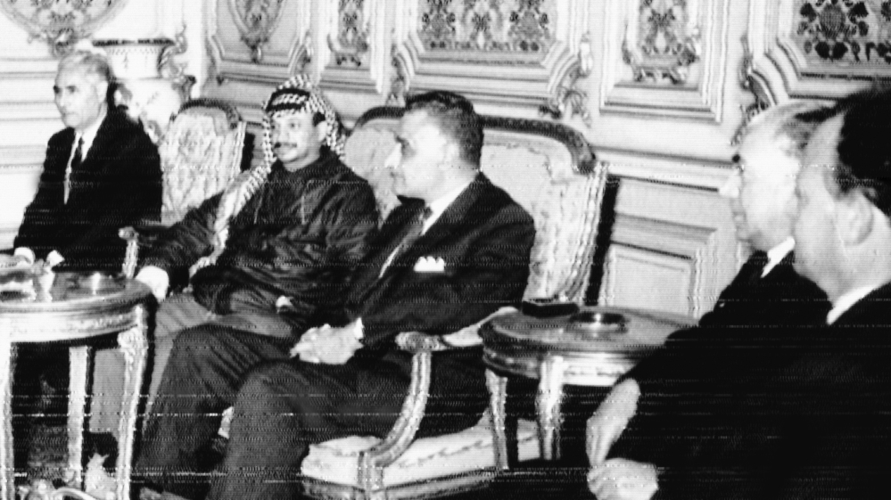 United Arab Republic's President Gamal Abdel Nasser sits beside the Chairman of the Palestine Liberation Organization Committee Yasser Arafat in Cairo on February 4, 1969, File: AP]