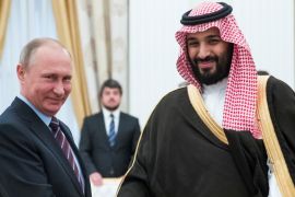Russian President Putin shakes hands with Saudi Deputy Crown Prince and Defence Minister bin Salman during a meeting at the Kremlin in Moscow