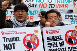 Protesters take part in a rally against U.S. President Donald Trump near South Korea''s presidential Blue House in central Seoul