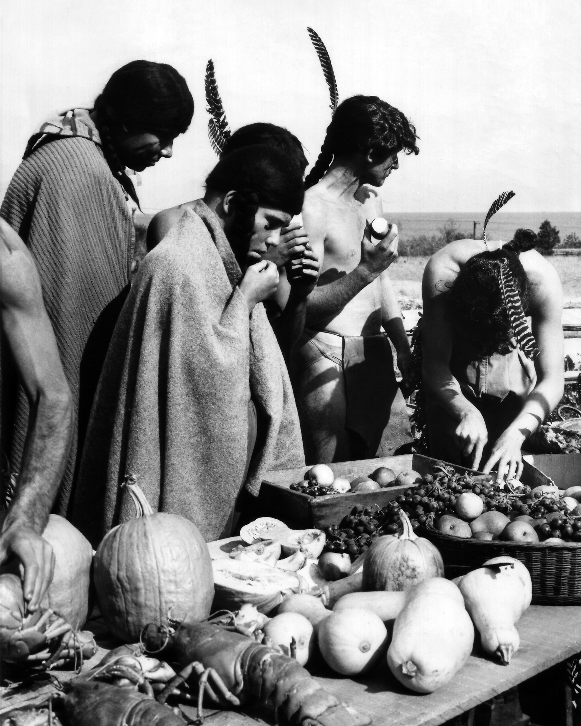 Native Americans are depicted at the first Thanksgiving feast, in a scene from a 1960 educational film about the Pilgrims’ first year in America [AP]