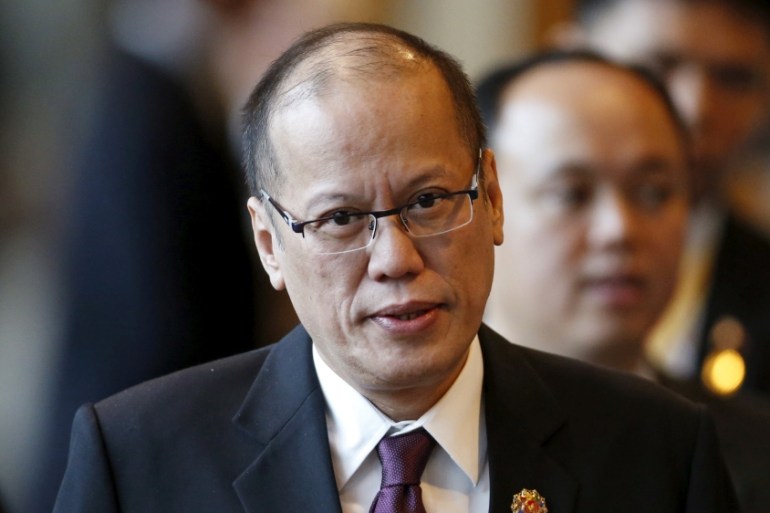FILE PHOTO Philippine President Aquino arrives at a session of the ASEAN Summit in Kuala Lumpur
