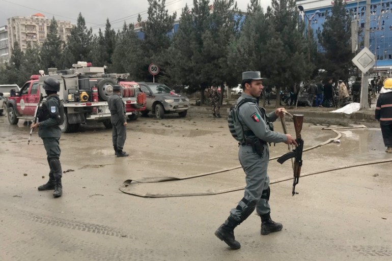 Afghan secuirty forces are seen at the site of an explosion in Kabul