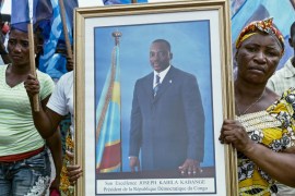 Civilians gather as they listen to the Democratic Republic of Congo''s President Joseph Kabila addressing the nation outside Palais du Peuple in the capital Kinshasa